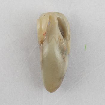 A group of three Chinese stone charms, 20th century.