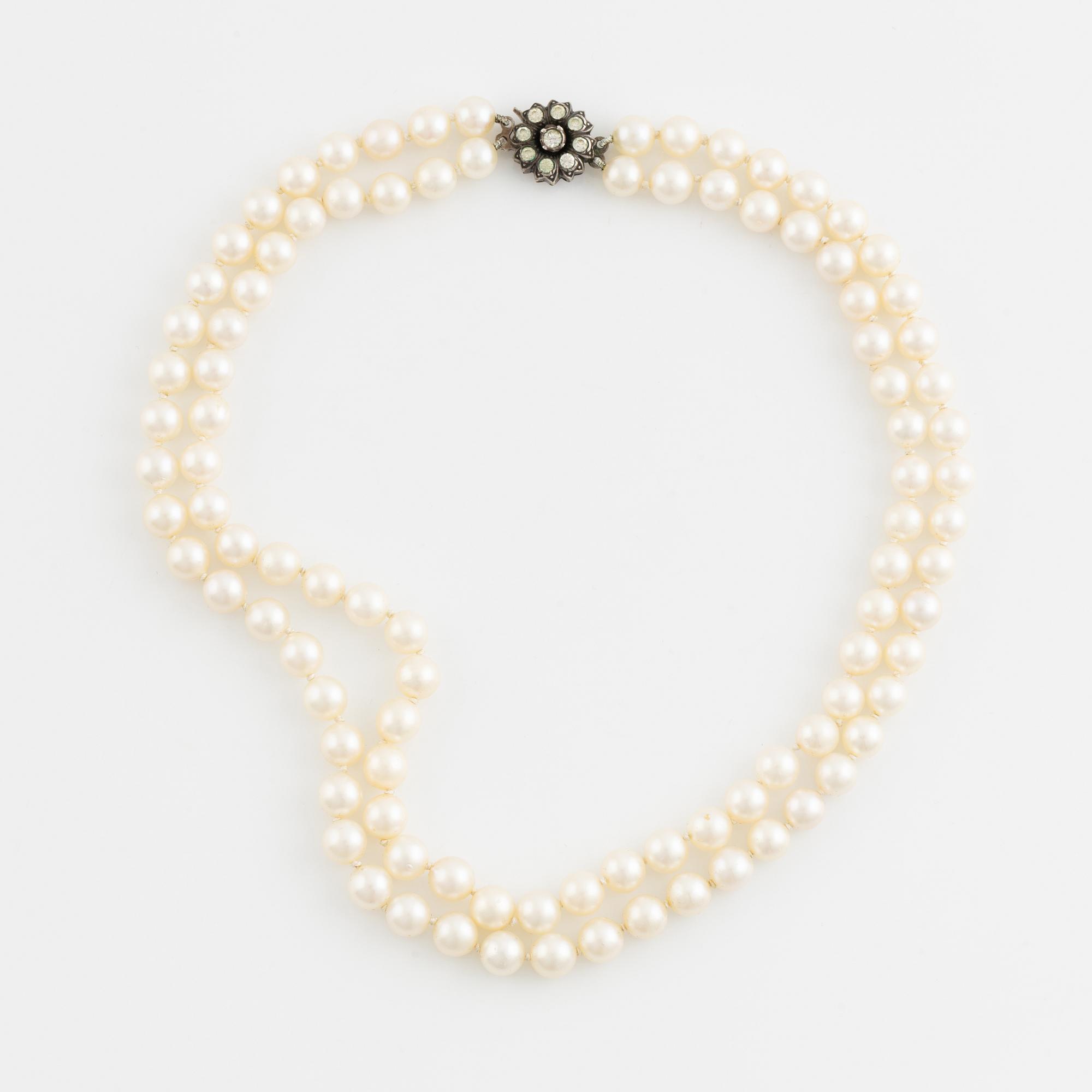 Cultured two strand pearl necklace, clasp silver with paste.