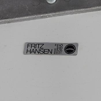 A COFFEE TABLE BY PIET HEIN AND BRUNO MATHSSON FOR FRITZ HANSEN 1985.