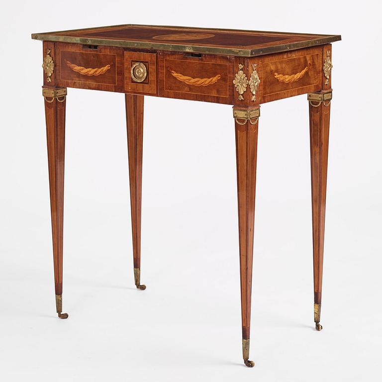 A Gustavian marquetry and gilt brass-mounted table by G. Iwersson (master in Stockholm 1778-1813).