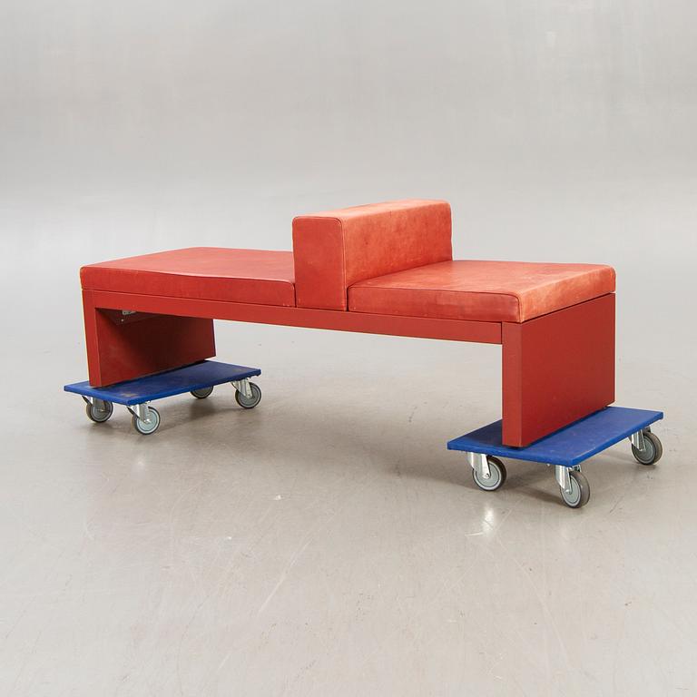 An Italian leather bench later part of the 20th century.