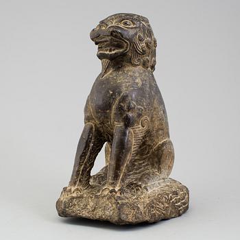 A stone sculpture of a mythical beast, China, 20th Century.