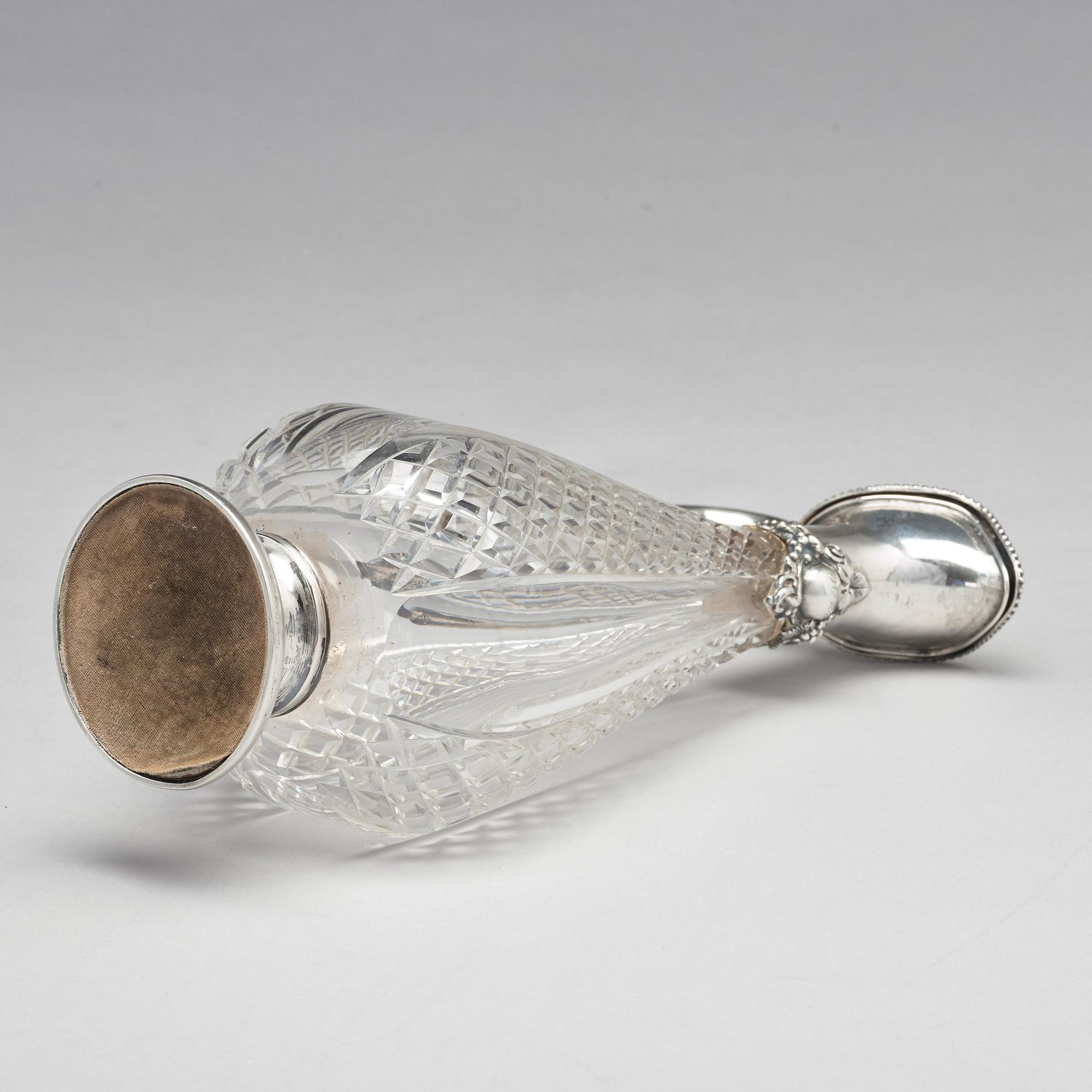 A Swedish 19th century parcel-gilt silver and glass wine-jug, mark of Lars Larsson & Co, Stockholm 1872.