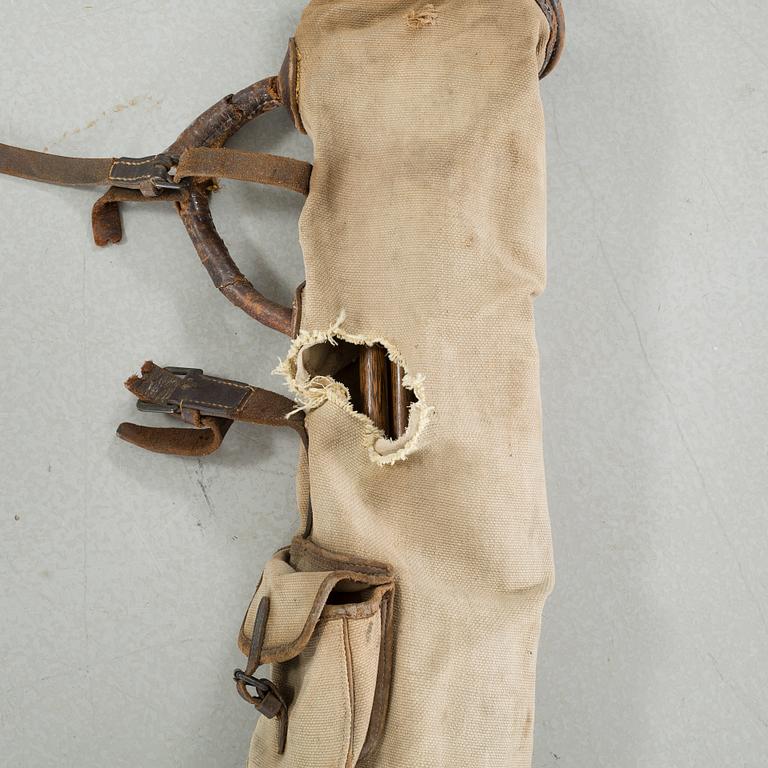 Seven golf clubs with bag, clubs by by "J Winton" & "Josh Taylor",, first half of the 20th century.