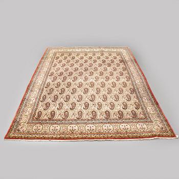 A CARPET, semi-antique Qum, ca 341 x 238 cm.