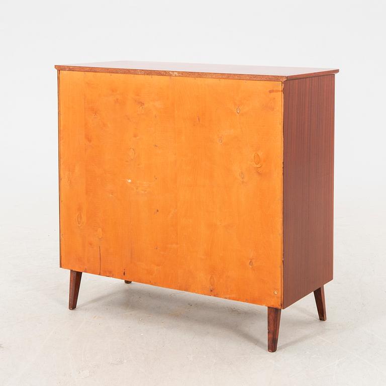 A 1950s teak sideboard/cabinet.