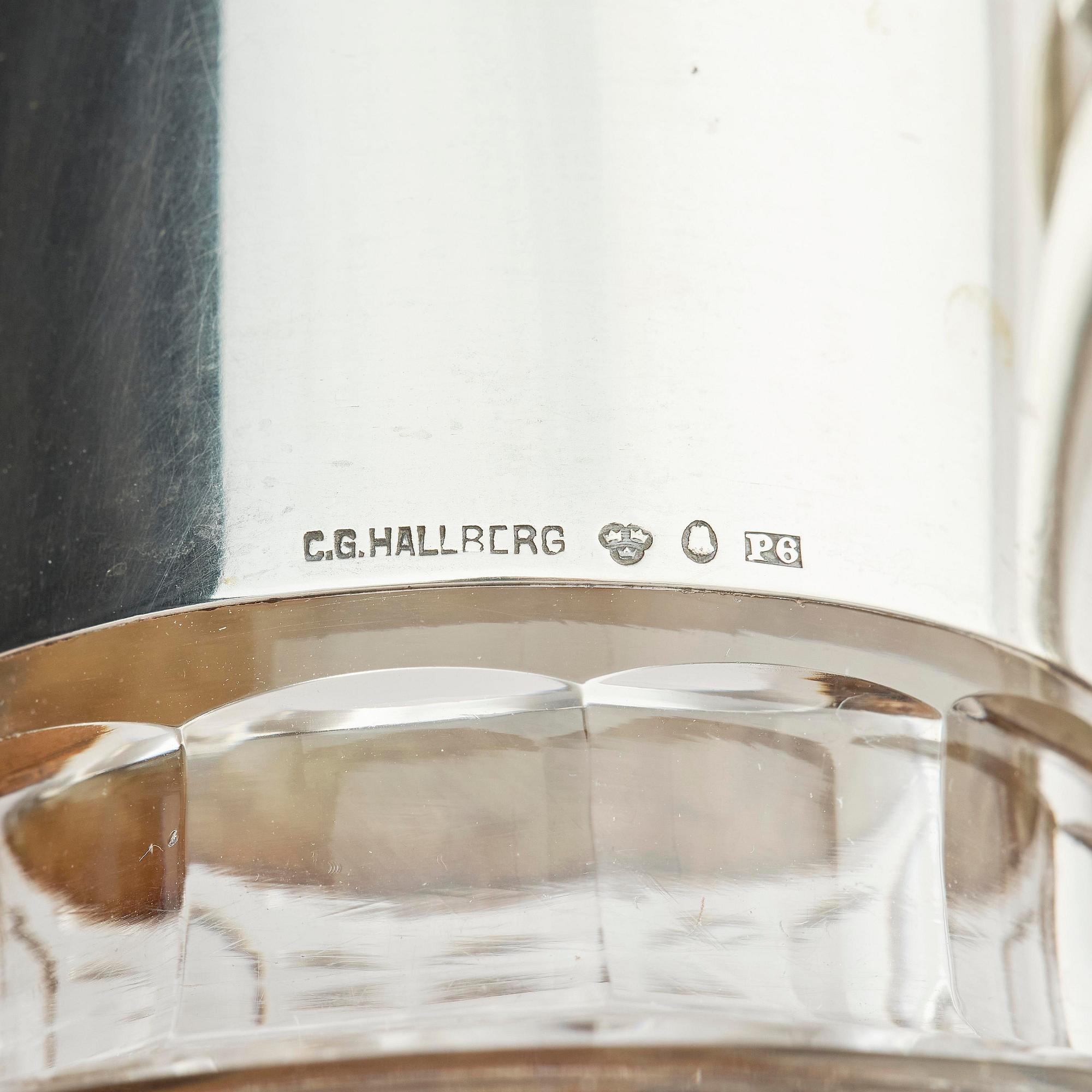 A Swedish pair of silver and cut-glass decanters, mark of C.G. Hallberg, Stockholm 1893.