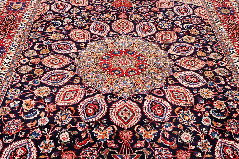 A Meshed carpet, c. 352 x 255 cm.
