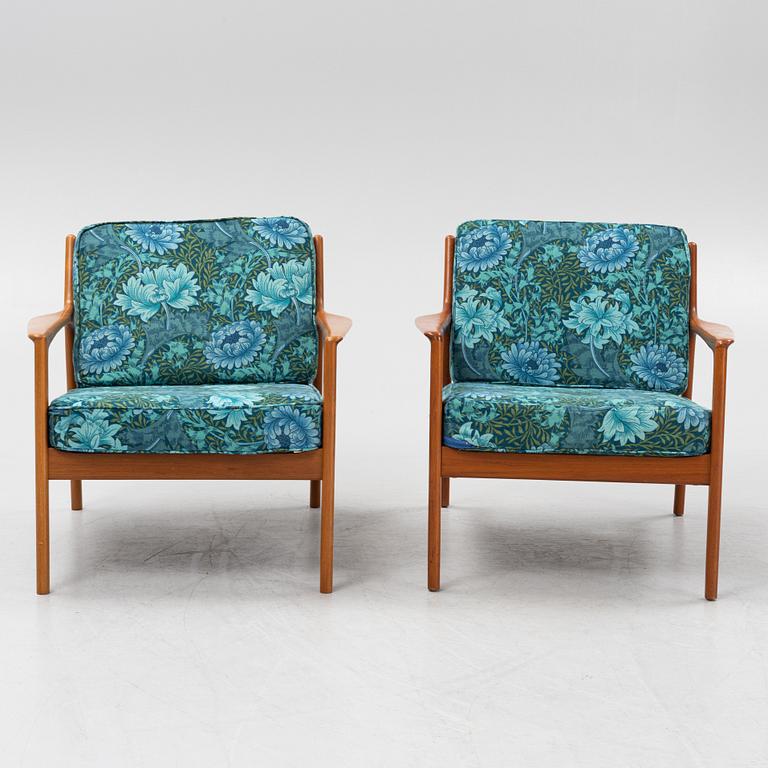 Folke Ohlsson, a pair of 'USA 75' armchairs, Dux, Sweden, 1960's.