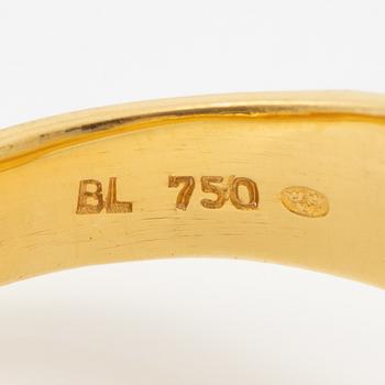 Ring 18K guld med en rund briljantslipad diamant.
