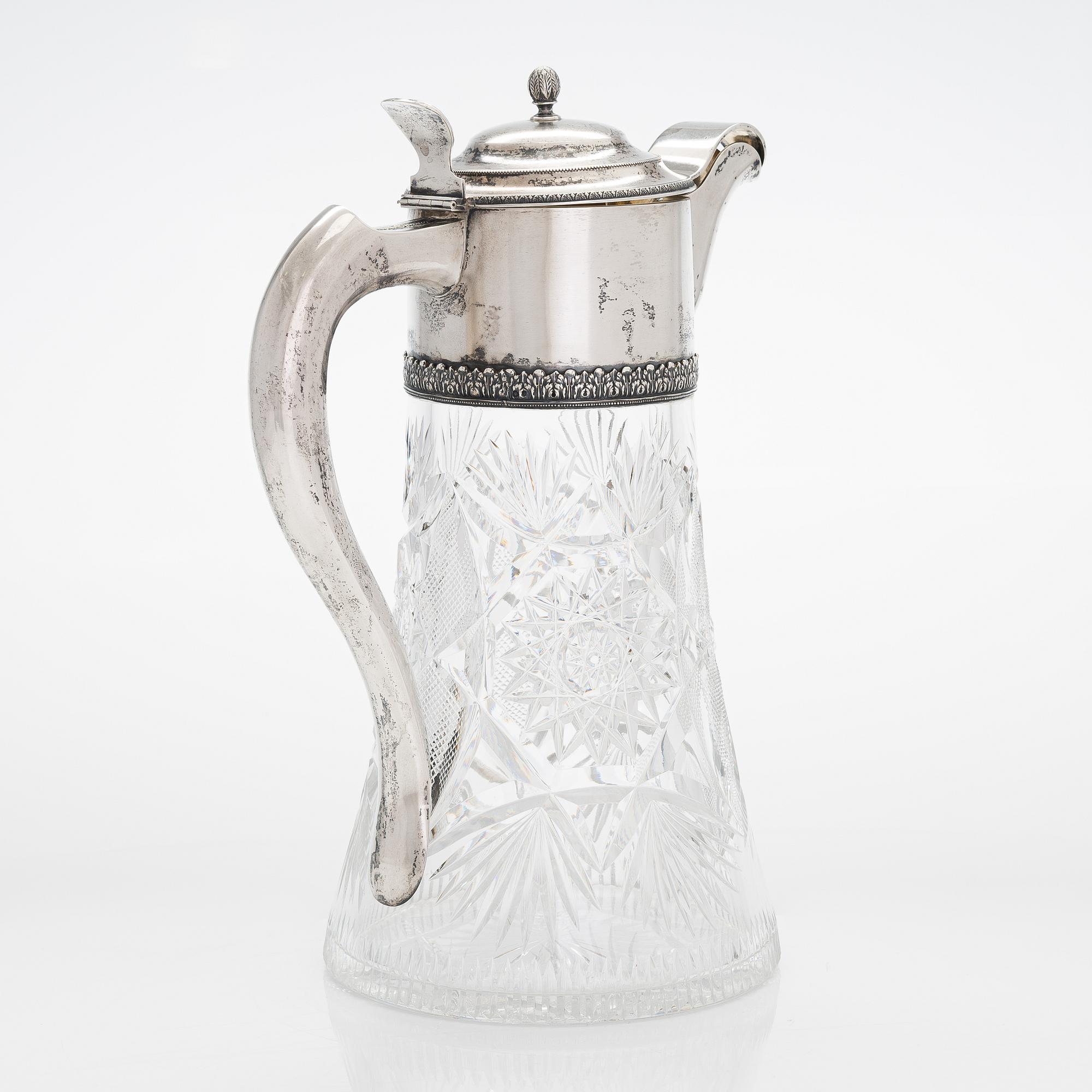 A glass carafe and box with silver mountings from the early 20th-century. Box marked in Saint Petersburg 1908-26.