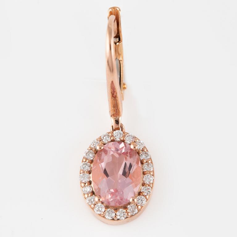 A pair of 14K gold earrings with faceted morganites and round brilliant-cut diamonds.