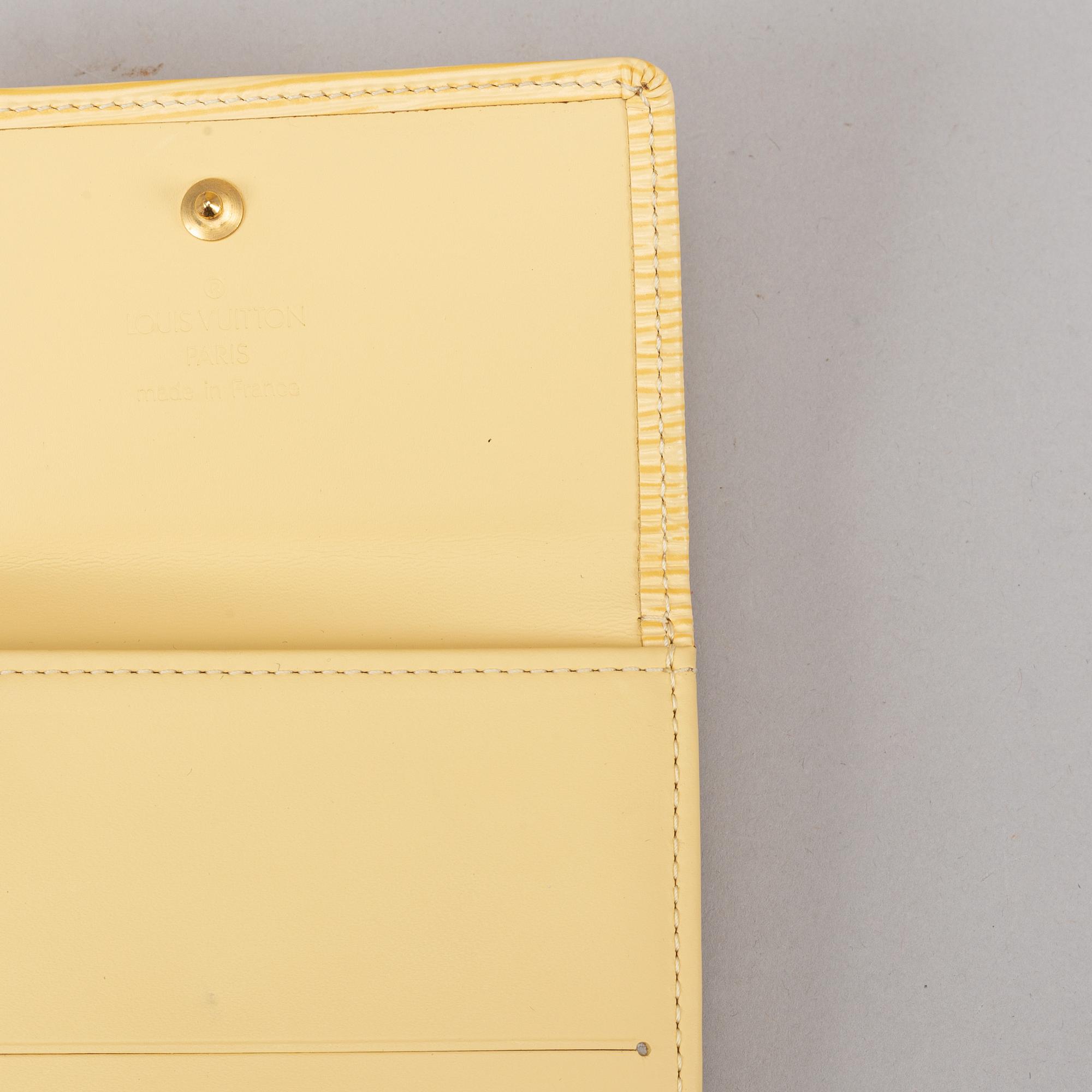 Louis Vuitton, 'Verseau Vanilla Epi leather bag' and wallet.