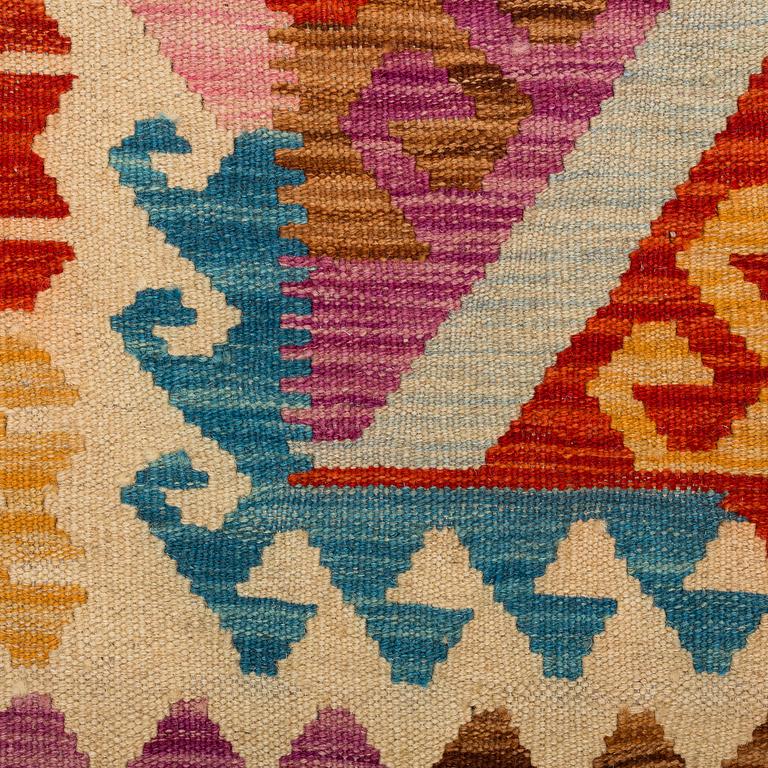 A CARPET, kilim, around 299 x 253 cm.