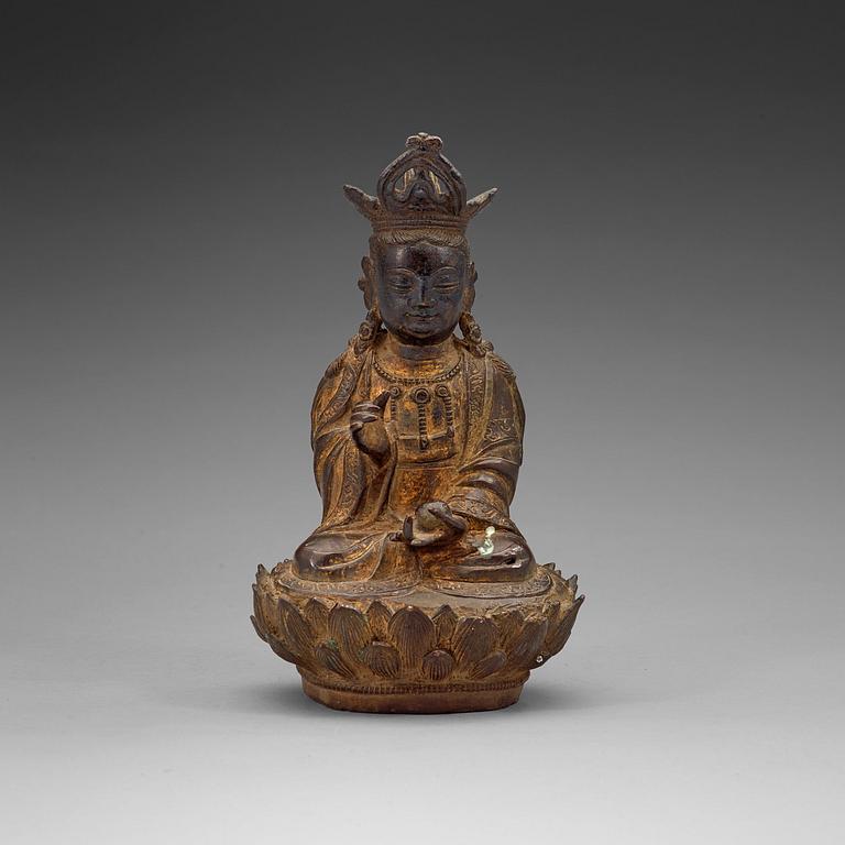 A bronze figure of Guanyin, late Ming dynasty (1368-1644).