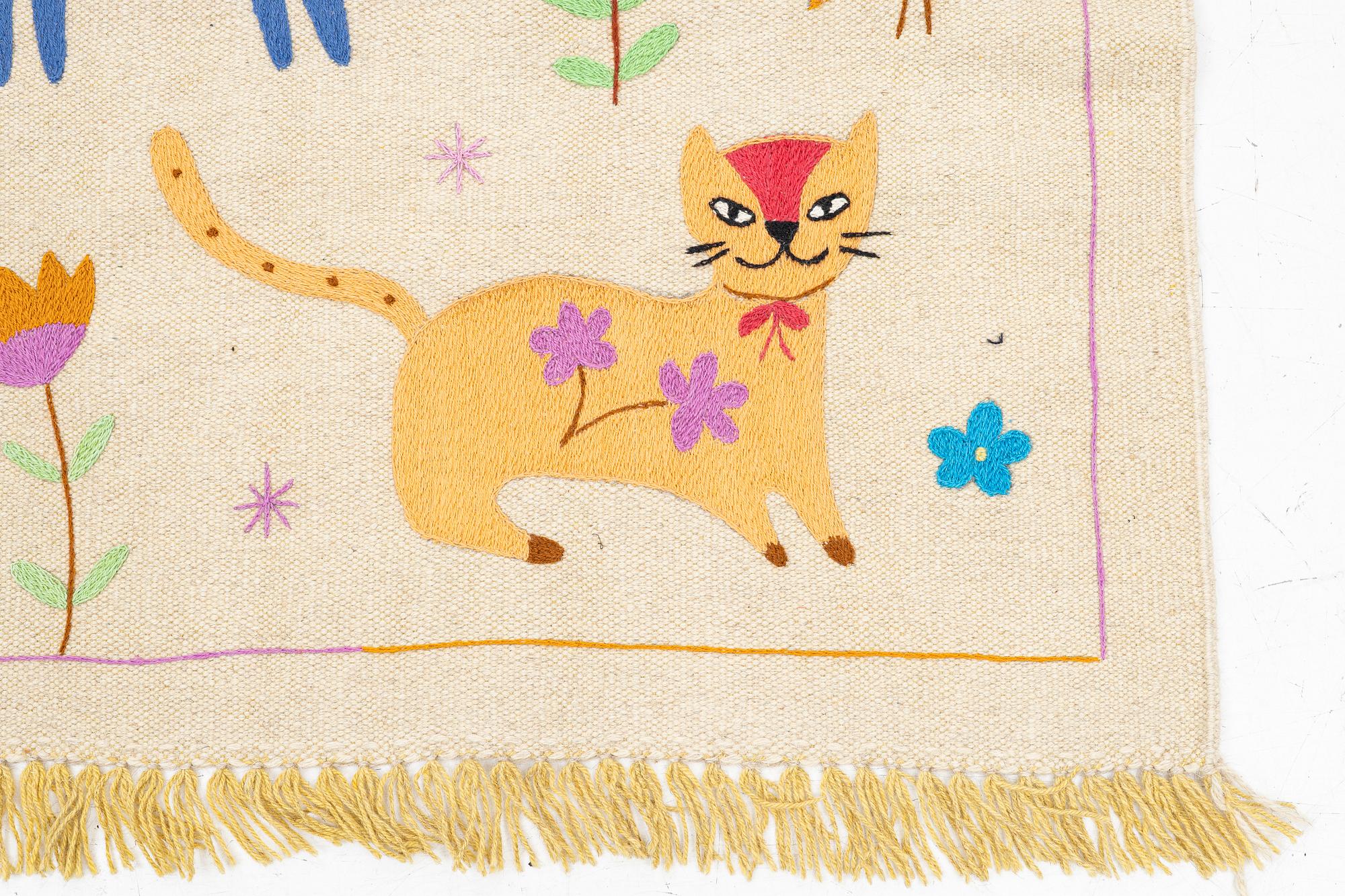 A hand-embroidered Kelim rug, c. 205 x 150 cm.