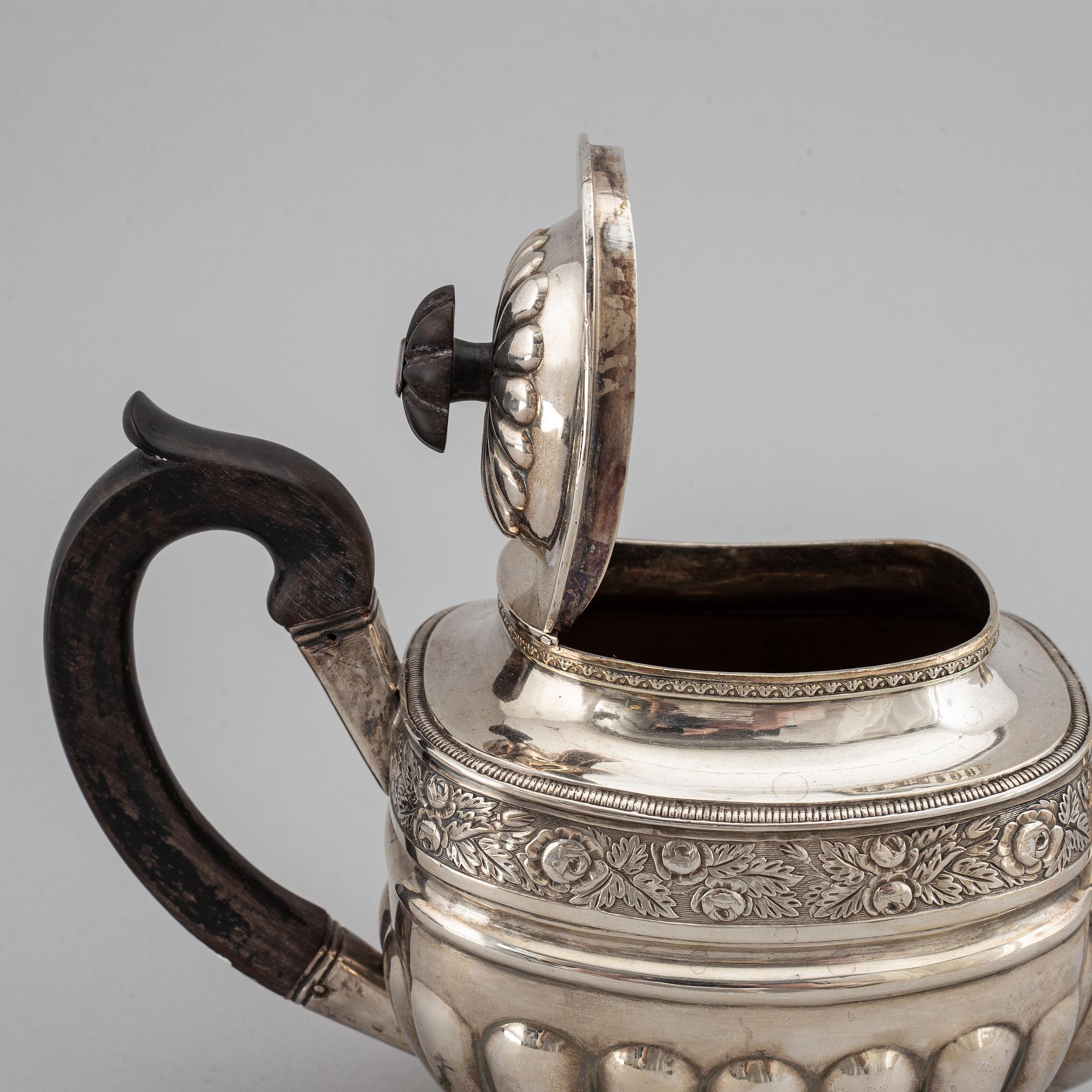 A Russian 19th century parcel-gilt silver tea-pot, mark of Anton Christian Iwersen, St. Petersburg 1828.