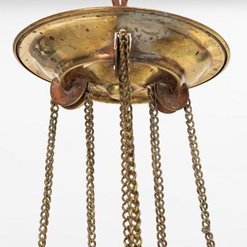 A brass and glass paraffin lamp, early 20th Century.