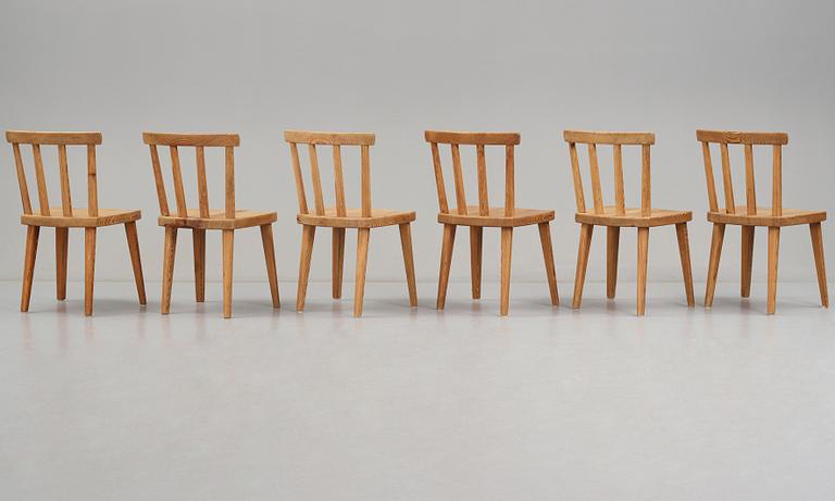 Axel Einar Hjorth, a set of six "Utö" stained pine chairs, Nordiska Kompaniet, Sweden 1930's.