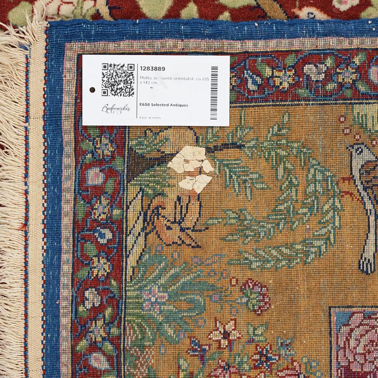 A rug, semi-antique oriental, ca 225 x 143 cm.