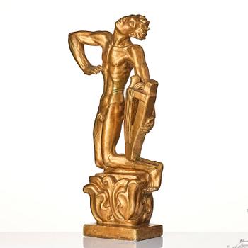 John Lundqvist, a gilded plaster sculpture of a lyre player, dated 1928.