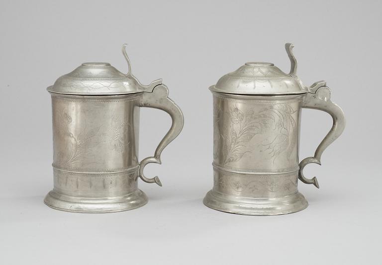 A set of two pewter pints. Makers mark by Gottlob F Bauman, Hudiksvall (1789-1826/31).