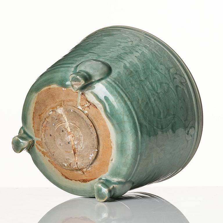 A large celadon tripod censer, Ming dynasty (1368-1644).