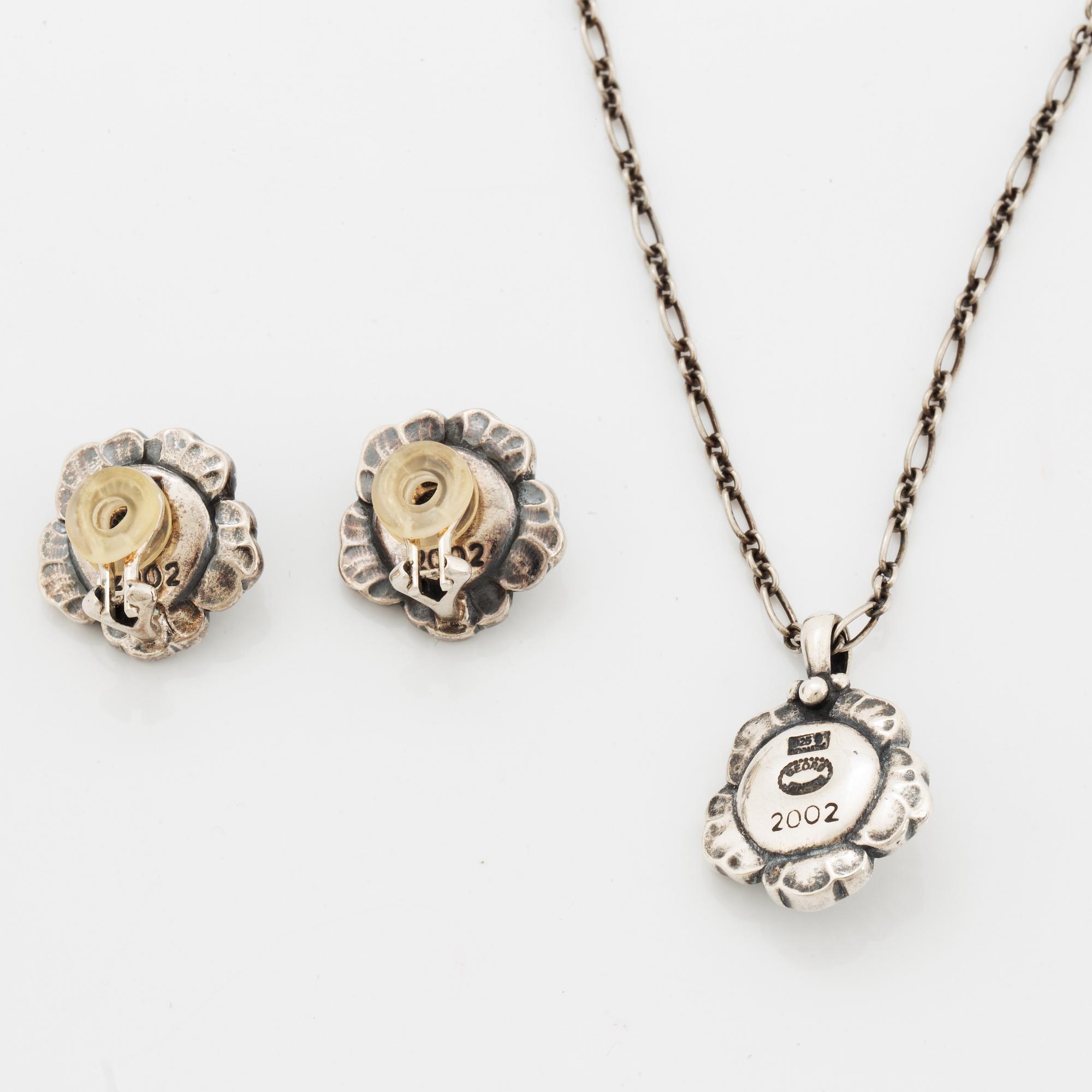 Georg Jensen Heritage silver a pair of earrings and a necklace.