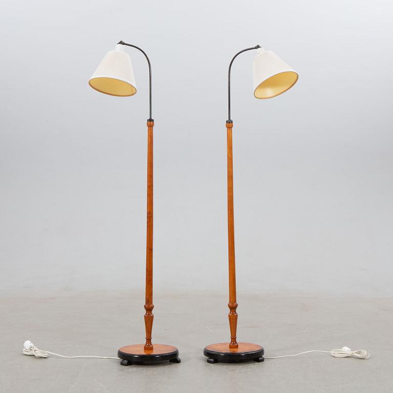 Floor lamps, a pair, 1940s.