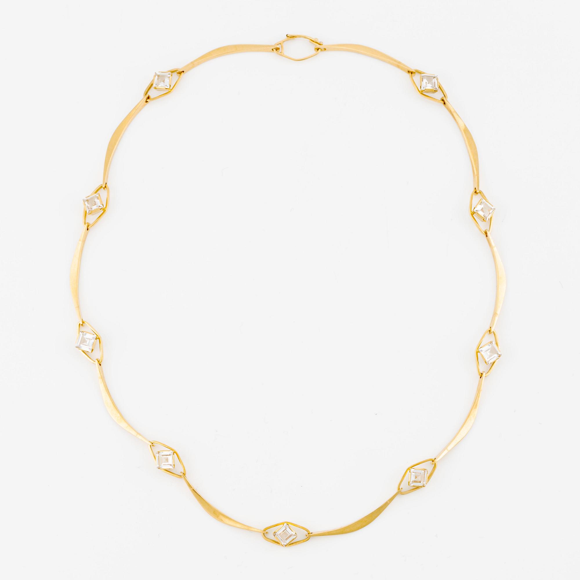 Collier, Öhmans, 18K guld med vita syntetiska stenar.