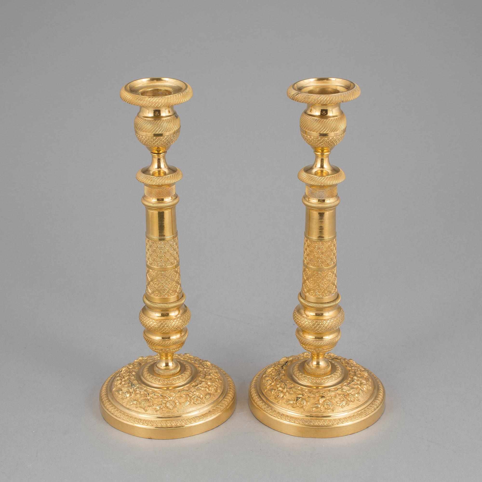 LJUSSTAKAR ett par, Förgylld brons. Senempire Frankrike, 1800-talets mitt.