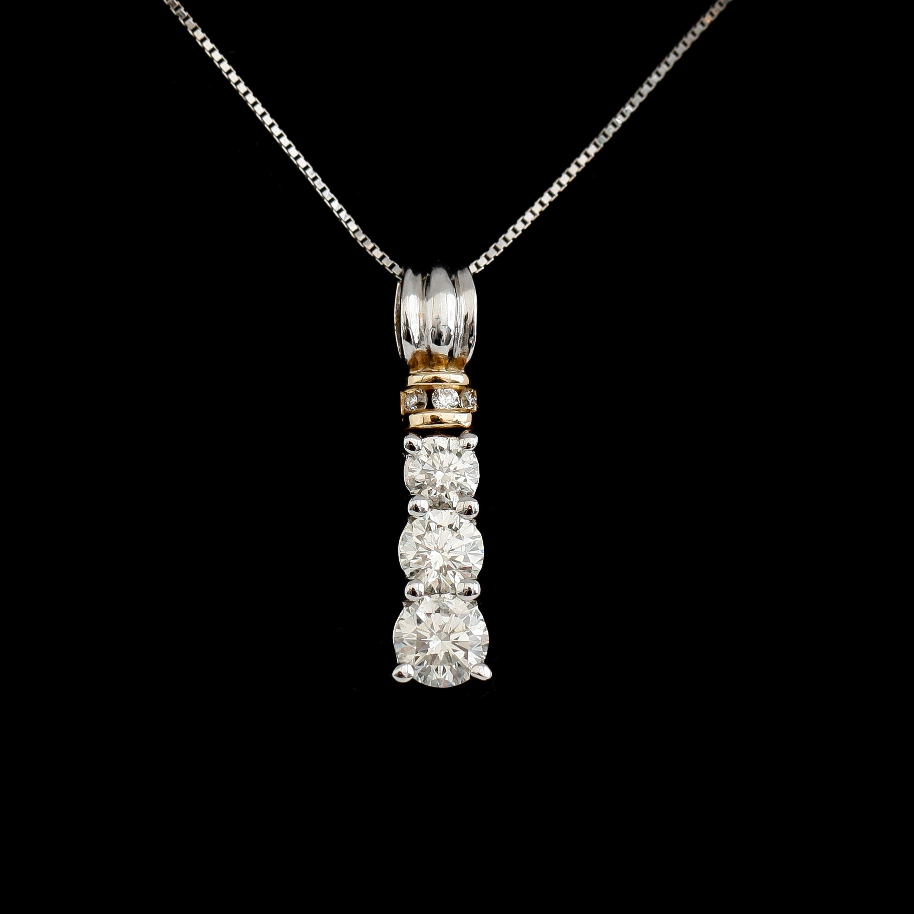 HÄNGE MED KEDJA, 14 k guld och vitguld, briljantslipade diamanter  tot ca 0.75 ct.