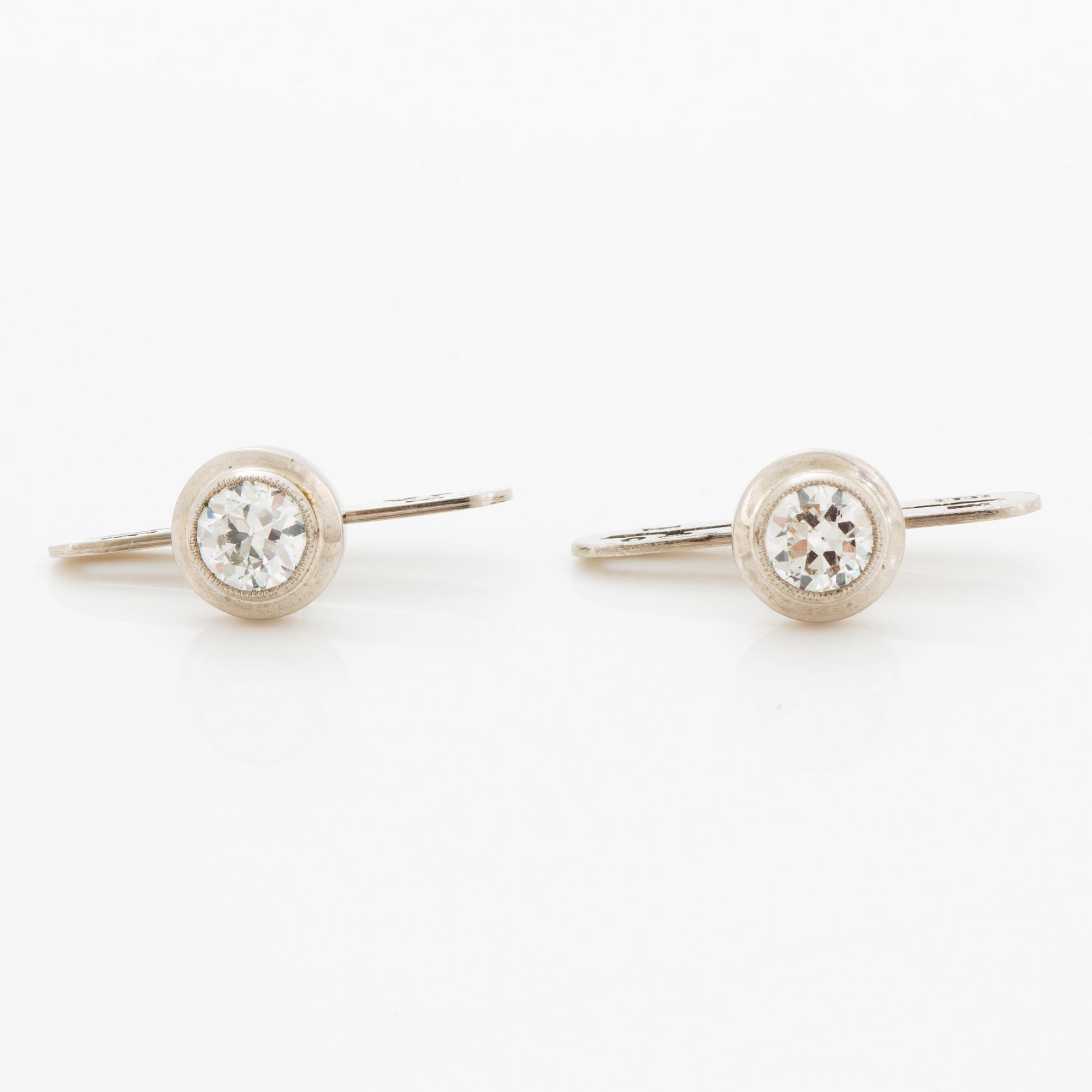 Brilliant-cut diamond shirt buttons.