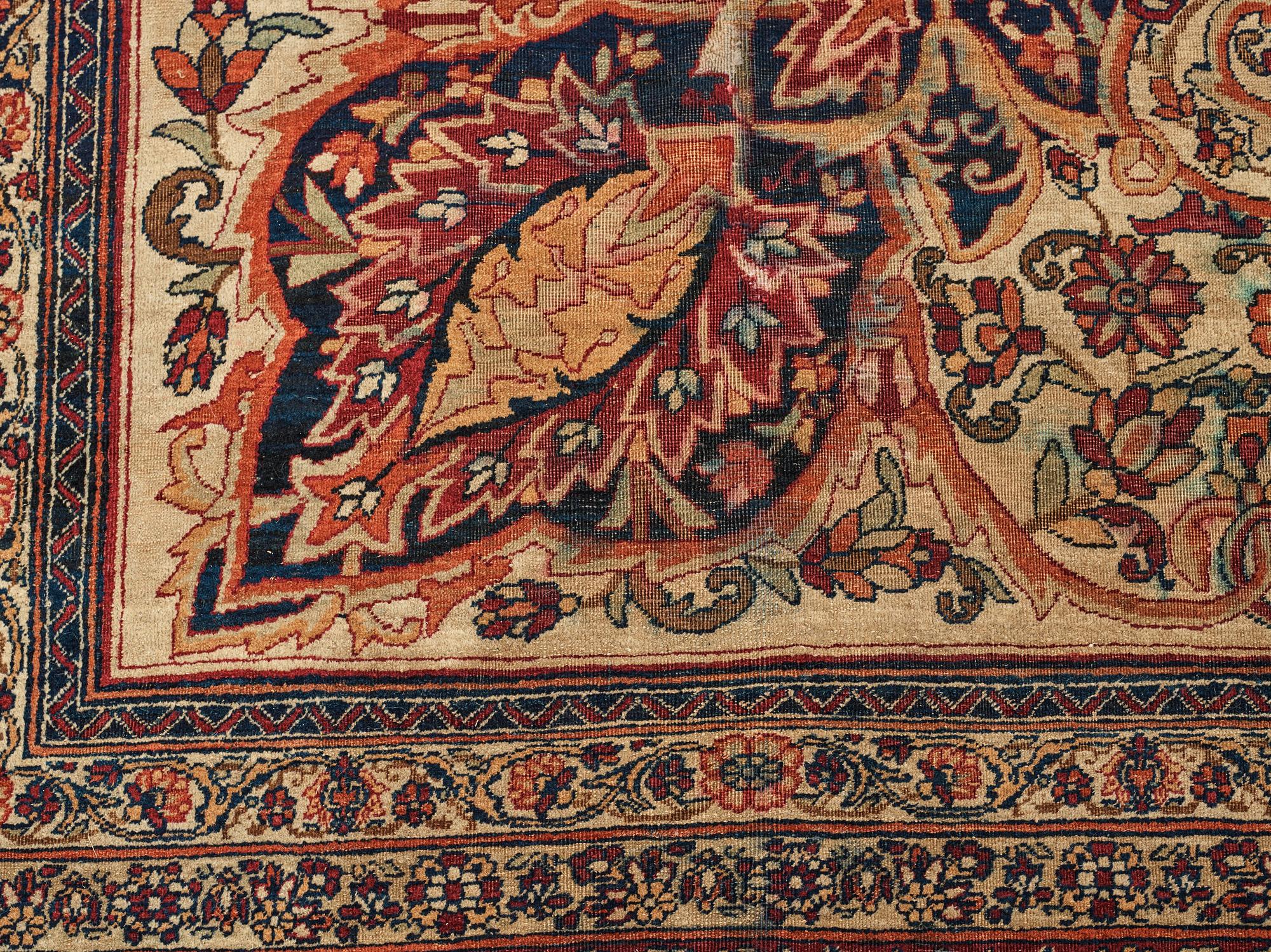A carpet, an antique Kerman Laver, ca 677-688,5 x 510,5-526 cm.