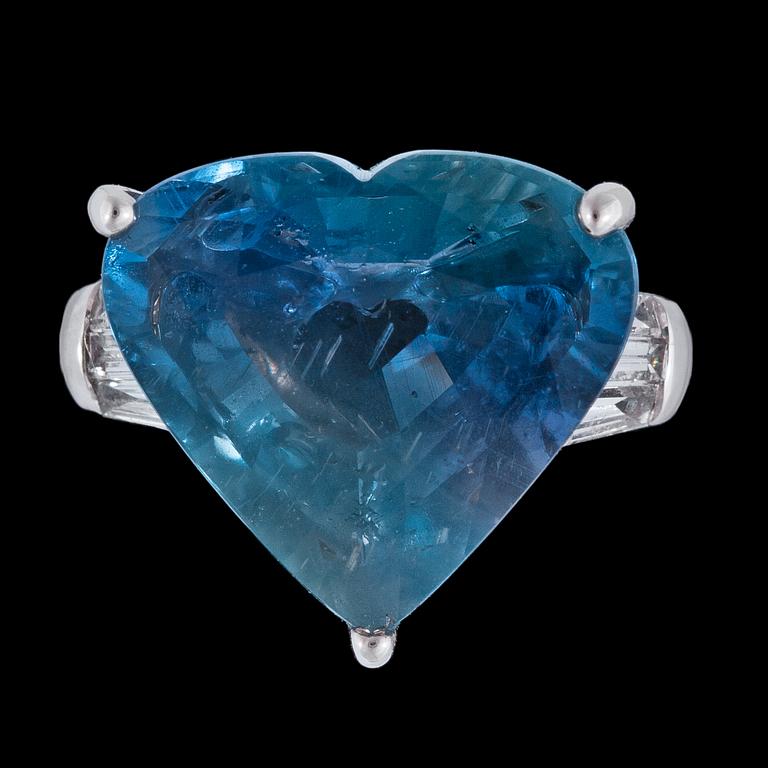 A heart cut blue sapphire, 10.66 cts, and baguette cut diamond ring.