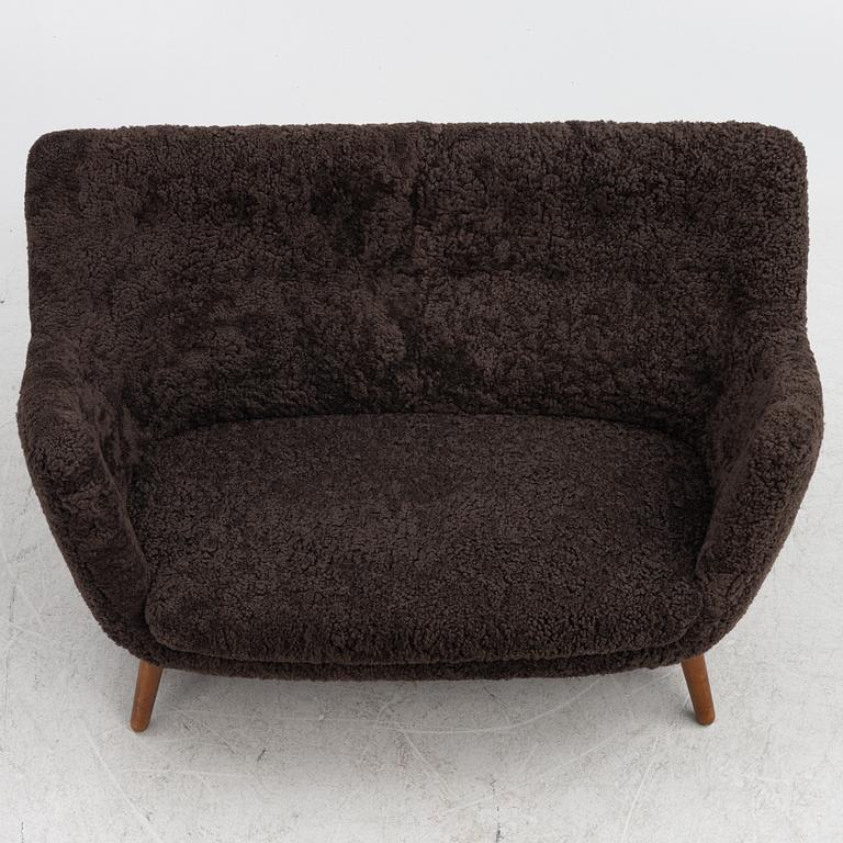 Finn Juhl, a 'Poet' sofa, Niels Vodder, mid 20th Century..