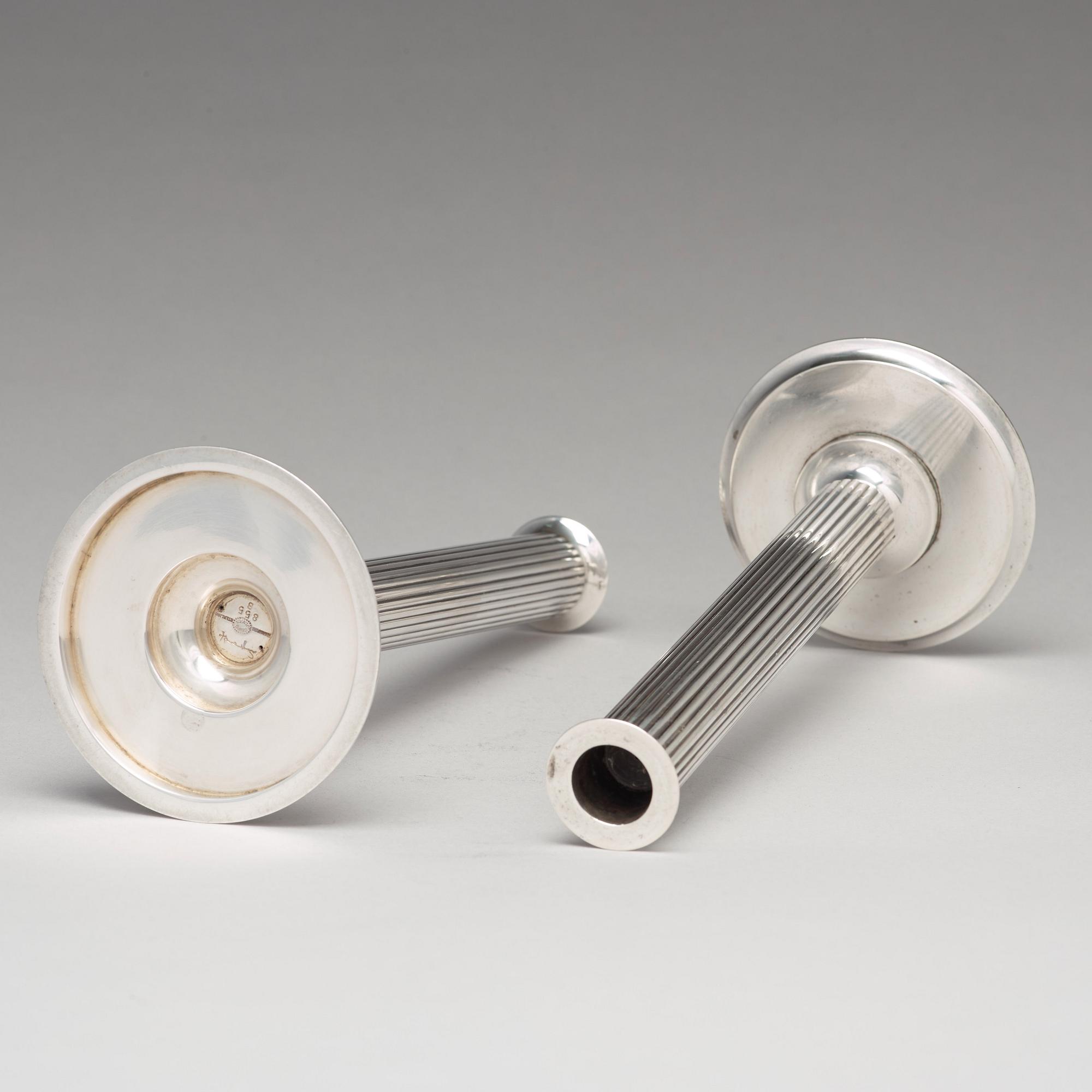 Sigvard Bernadotte, a pair of sterling silver candlesticks, Georg Jensen, Copenhagen 1945-77, design nr 855B.