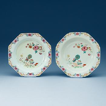 A set of seven (5+2) famille rose 'double peacook' dinner plates. Qing dynasty, Qianlong (1736-95).