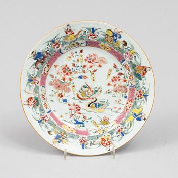 A Chinese famille rose 'immortals' plate, Qing dynasty, Yongzheng (1723-35).