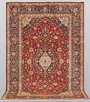 A carpet, Kashan, signed, ca 300 x 204 cm.