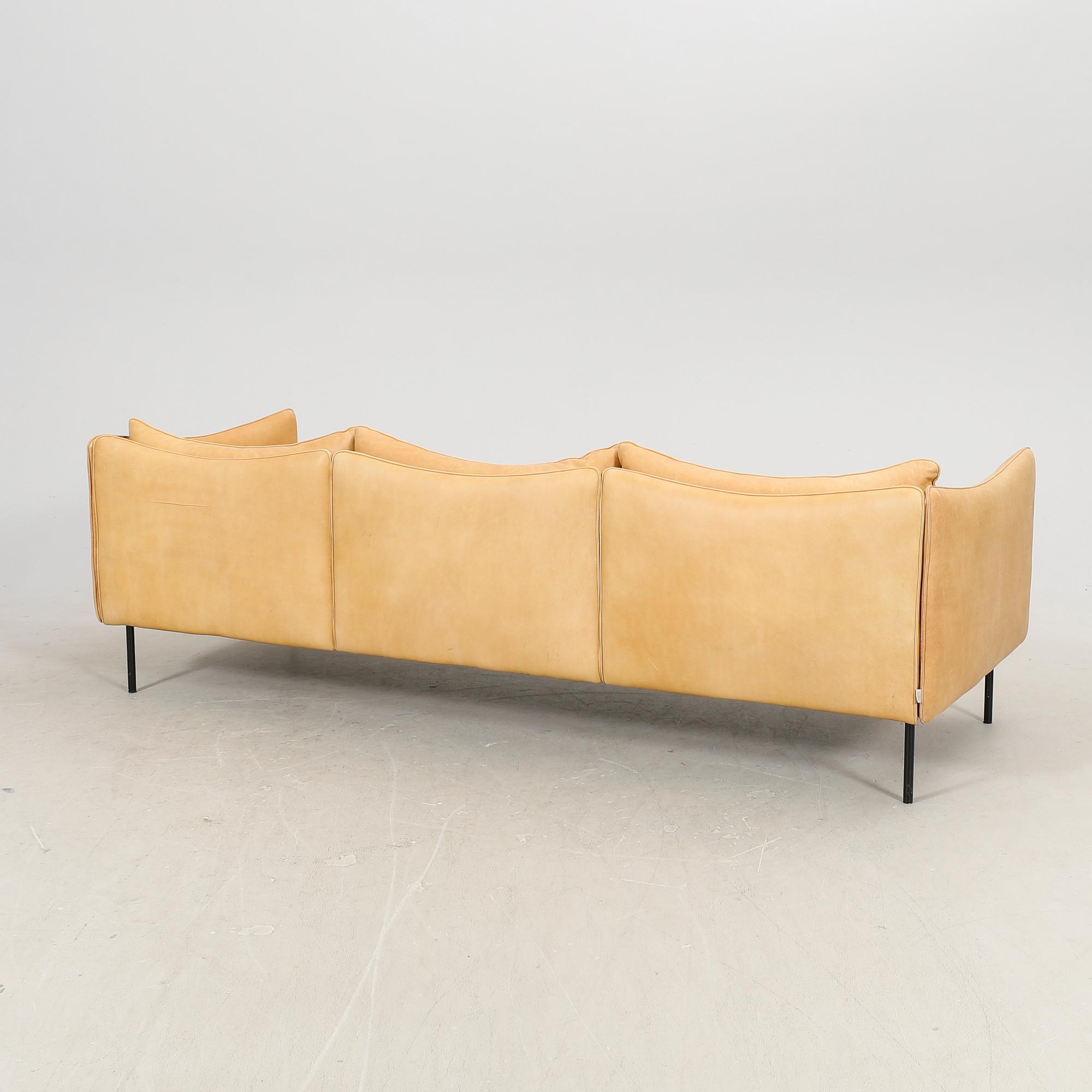 Andreas Engesvik, a Tiki leather sofa and stool for Fogia 21st century.