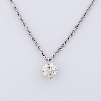 An 18K white gold necklace with a ca 0.6 ct diamond.