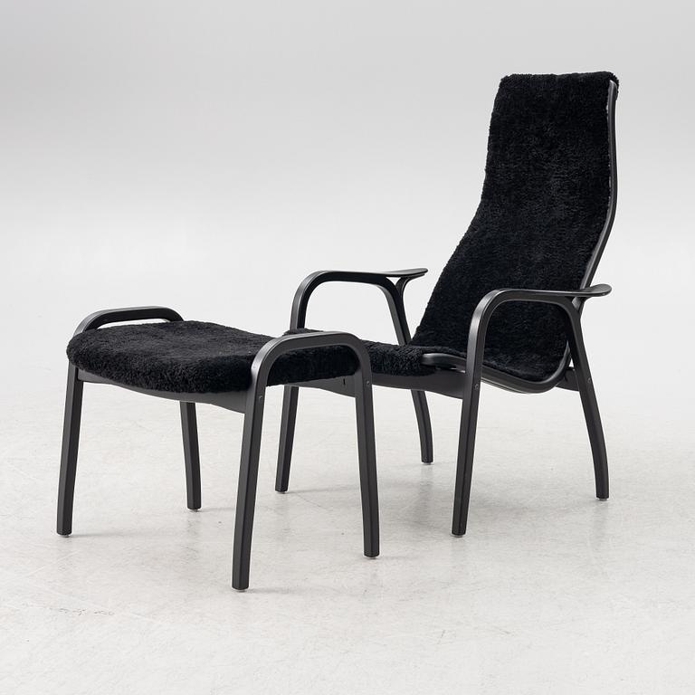 Yngve Ekström, a  'Lamino' easy chair with foot stool, Swedese, 2018.