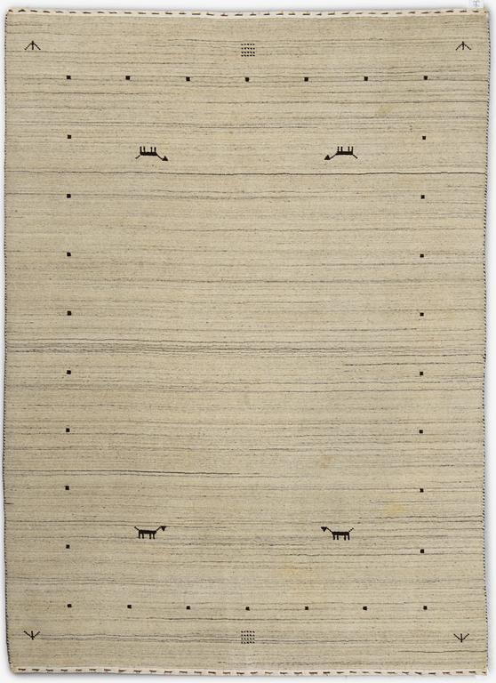 A Loribaf rug, ca 240 x 169 cm.