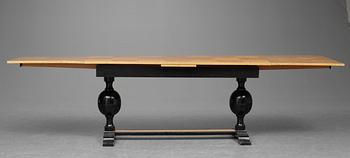 A Swedish birch burrwood and black laquered library table, 1920's.