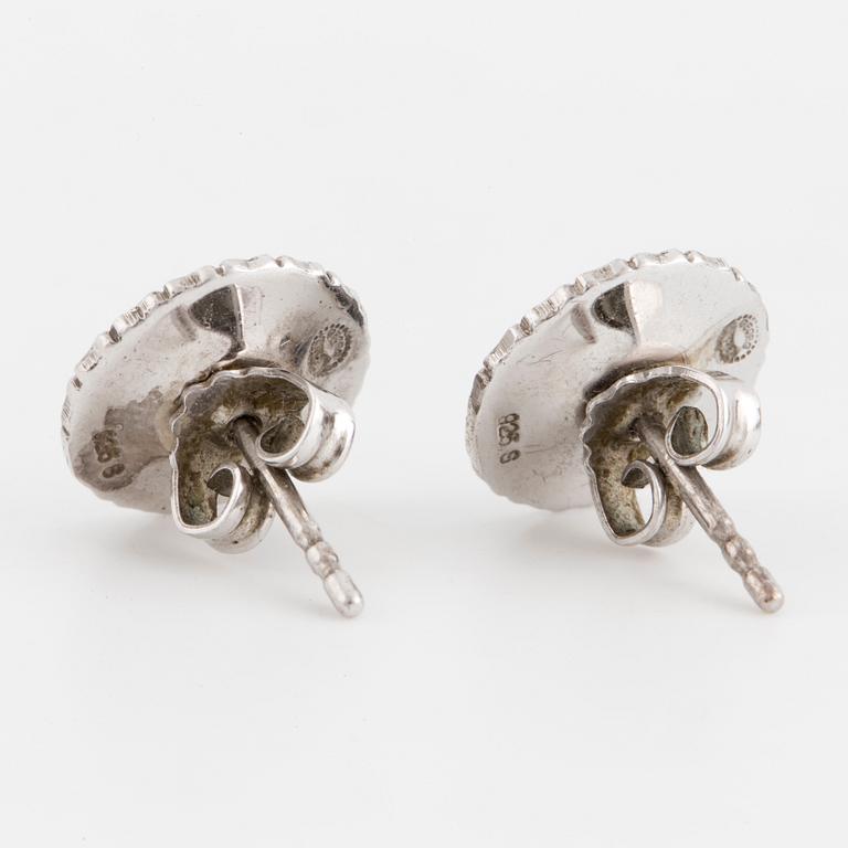 SMYCKESGARNITYR, 4 delar, Georg Jensen, 'Daisy,' sterlingsilver och svart emalj.