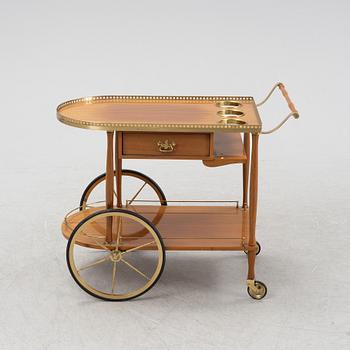 A mahogany-veneered serving trolley, mid 20th Century.