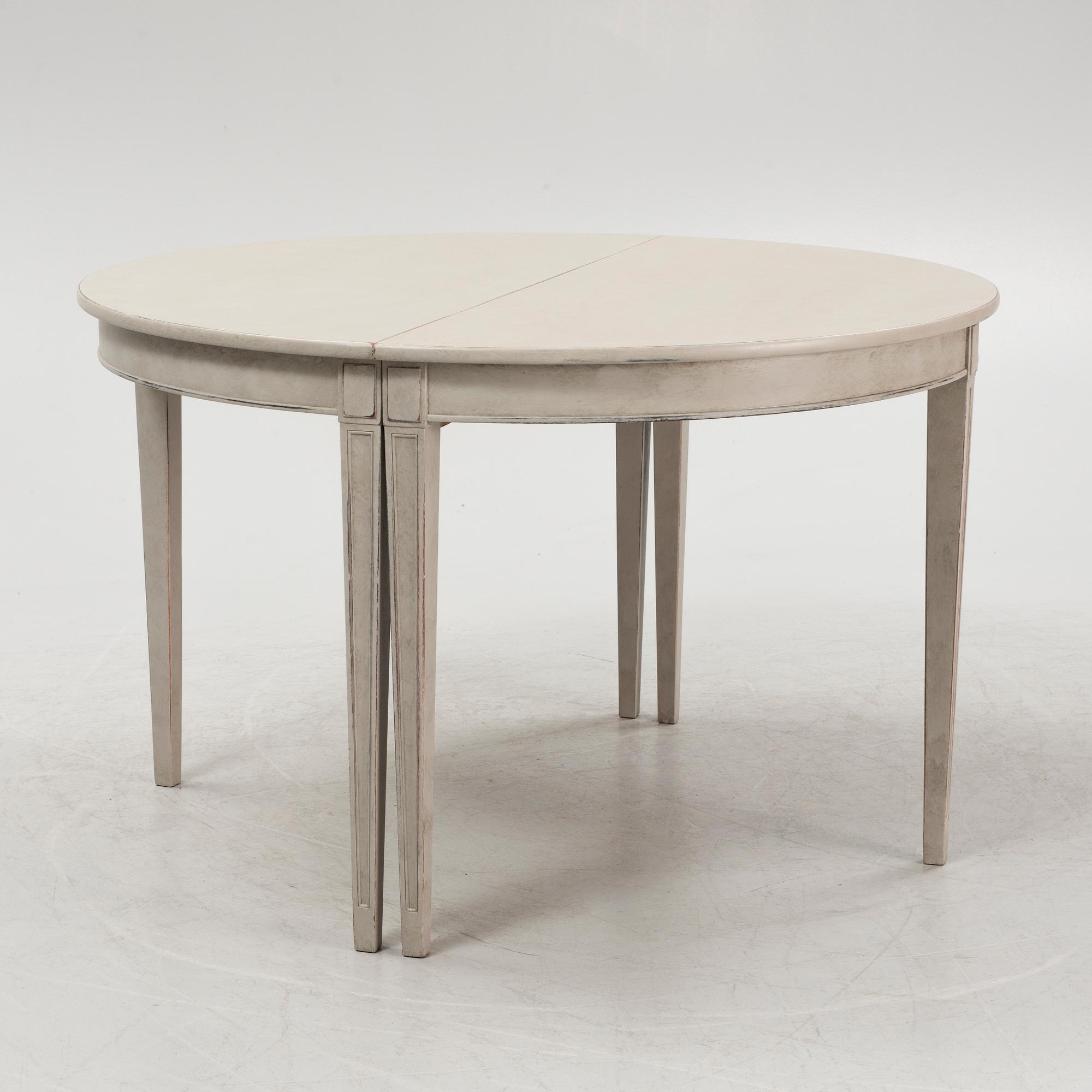 A Gustavian style dining table, first half/mid 20th century.