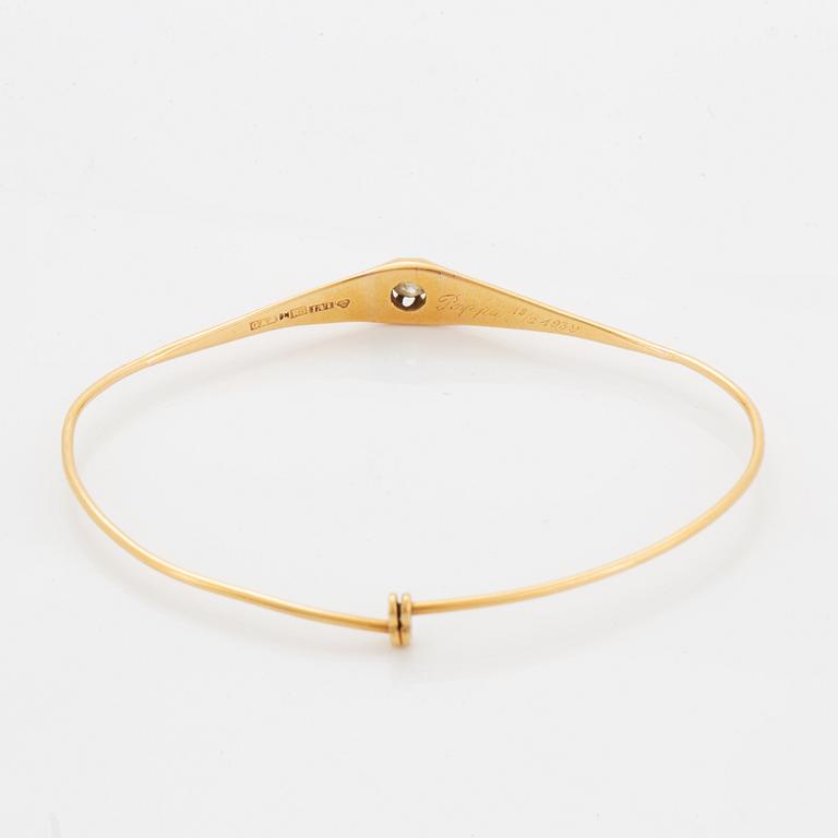 ARMRING, guld med gammalslipad diamant.