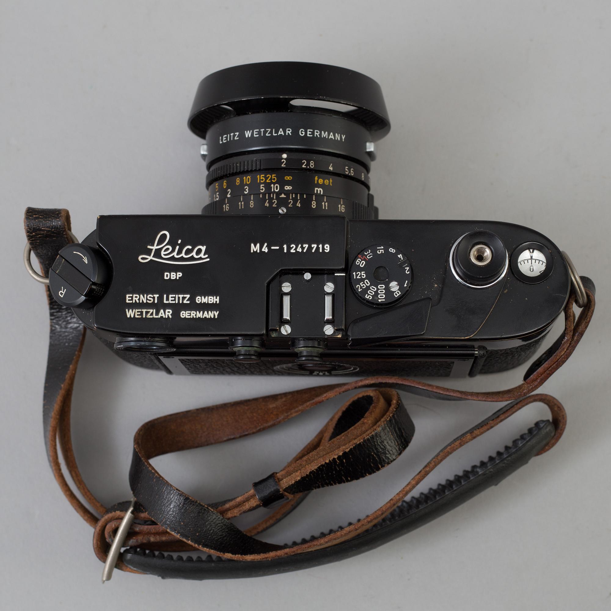 A black body Leica M4 no 1247719 from 1969-70 from Weitzlar with Summicron 1:2 / 35 and a Leica- Meter.